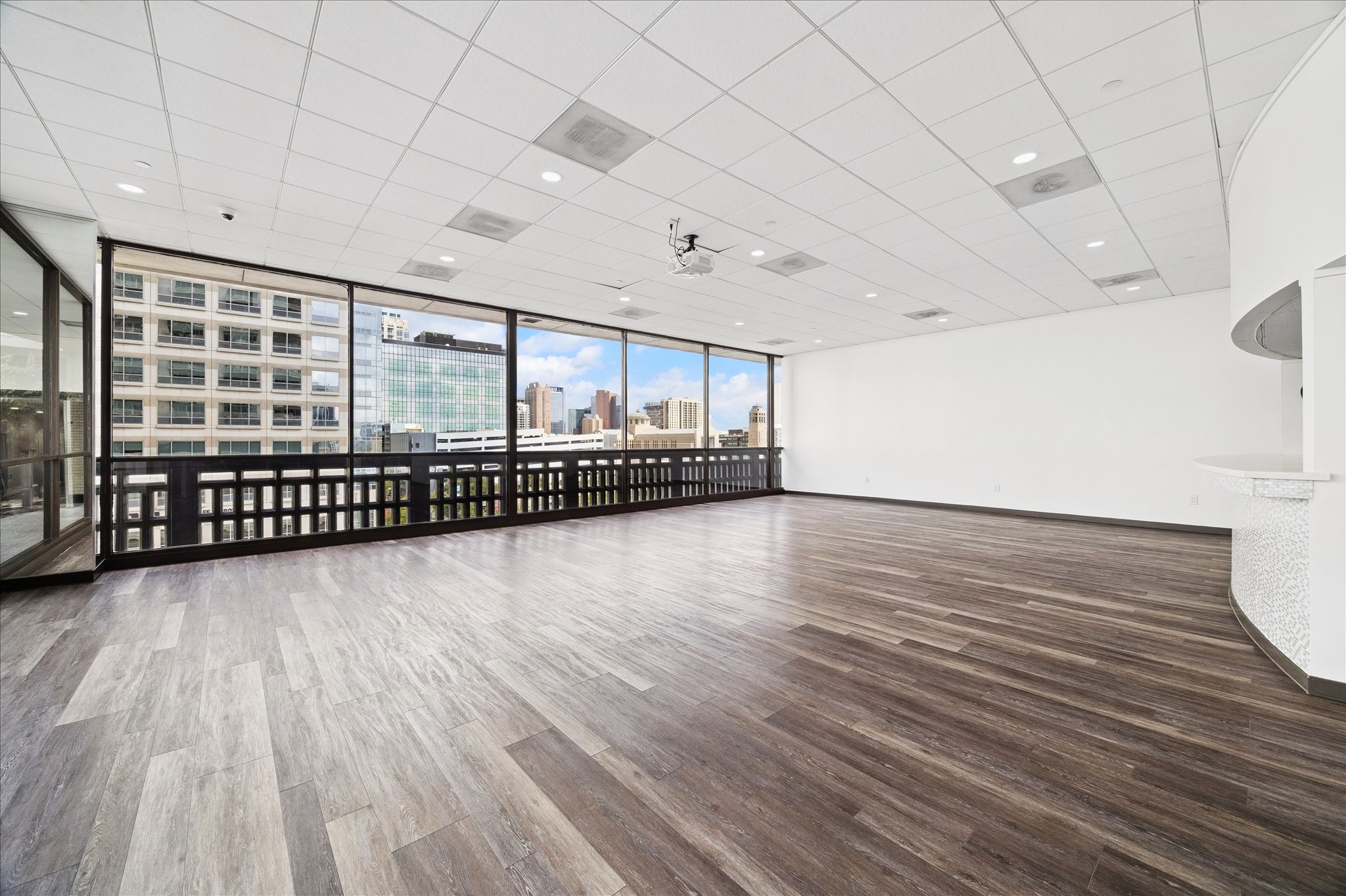 2016 Main Street, Unit 2417 Houston, TX 77002 - Photo 27 of 40 a view of a room with wooden floor