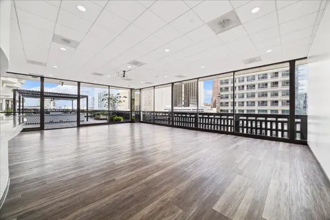 a view of a room with lots of wooden floor