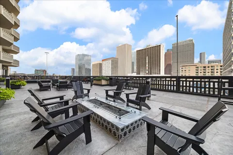 a view of a terrace with sitting area