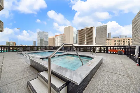 a view of a terrace with sitting area