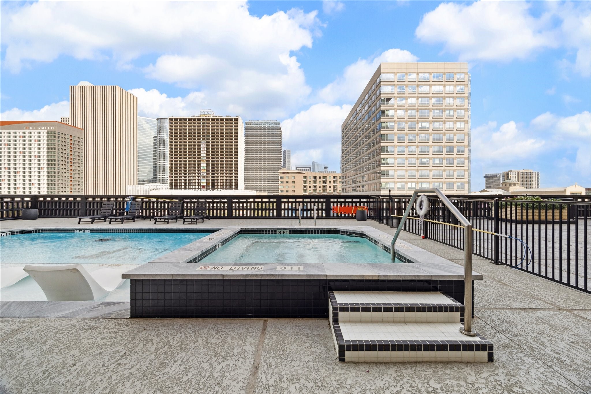 2016 Main Street, Unit 2417 Houston, TX 77002 - Photo 37 of 40 a view of swimming pool with outdoor seating