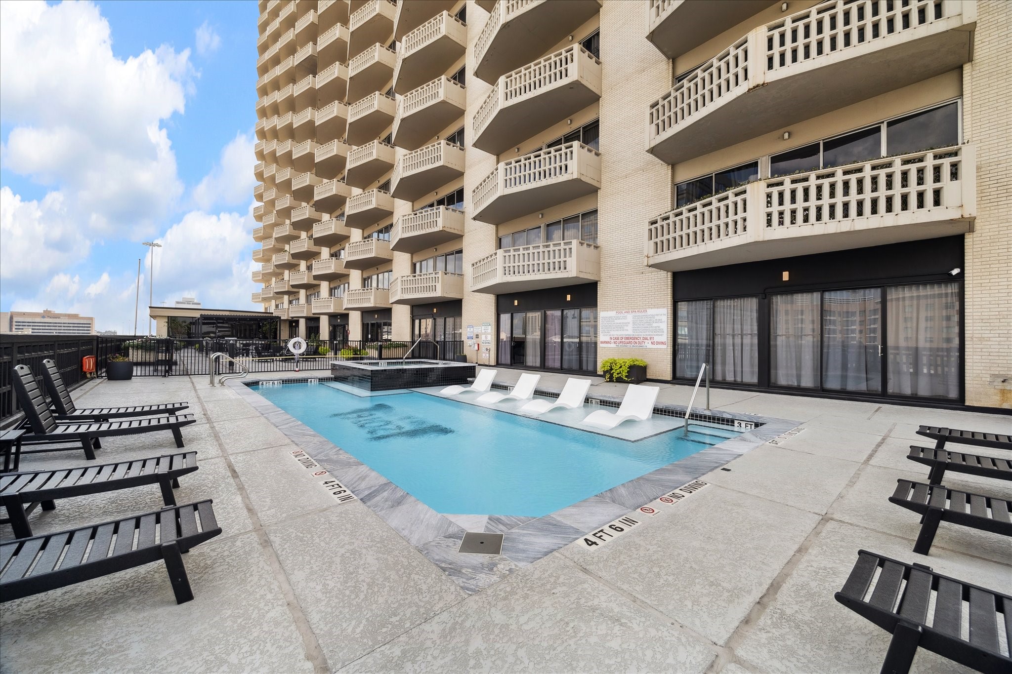 2016 Main Street, Unit 2417 Houston, TX 77002 - Photo 40 of 40 a view of a house with swimming pool and sitting area