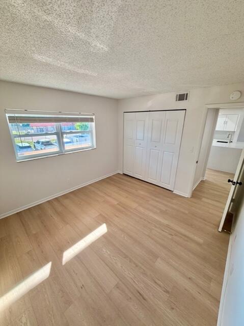 9374 Southwest 3rd Street, Unit 714 Boca Raton, FL 33428 - Photo 16 of 21 a view of a room with wooden floor