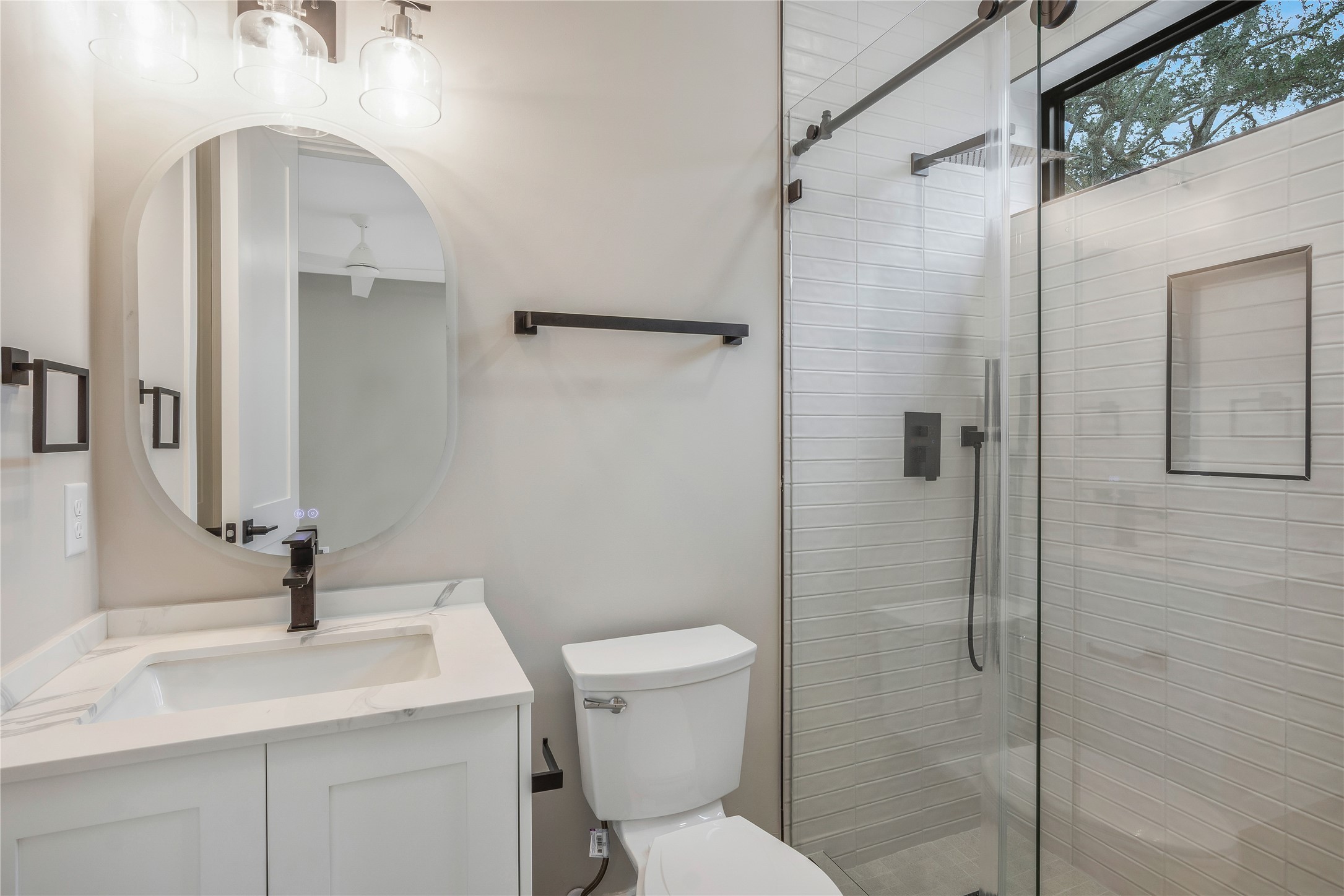 2239 Blalock Road Houston, TX 77080 - Photo 6 of 33 a bathroom with a sink toilet and shower