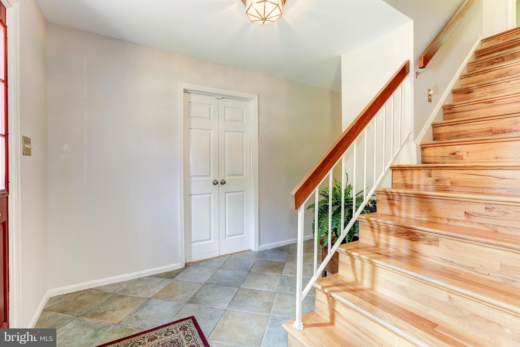 7024 Flax Street Springfield, VA 22152 - Photo 2 of 30 FOYER, DOUBLE DOORS ON LEFT TO LIBRARY