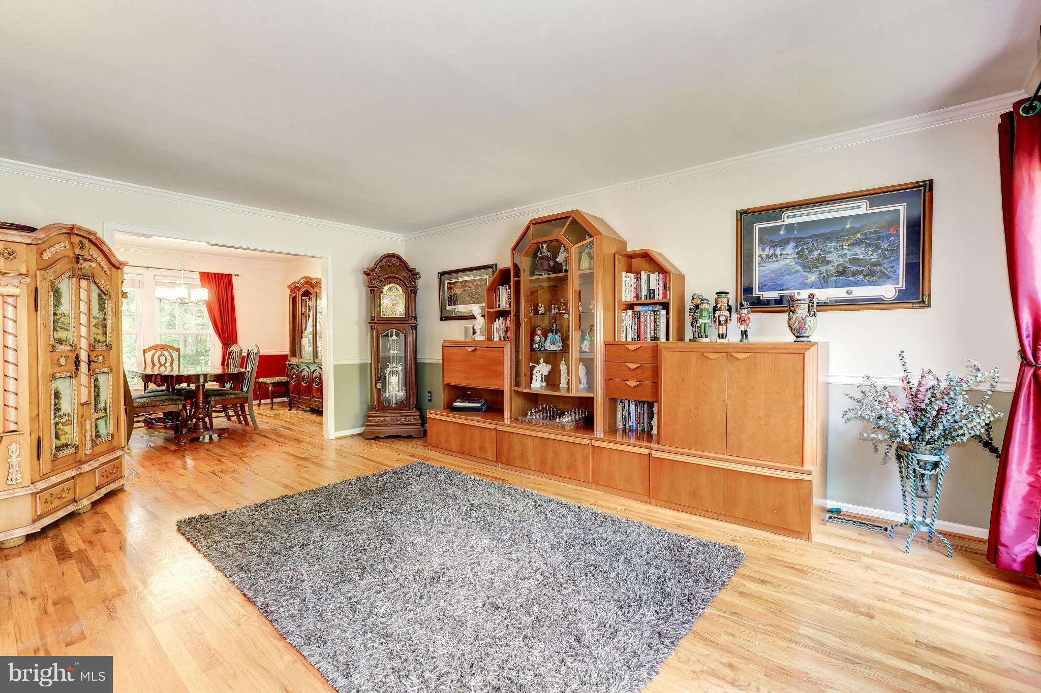 7024 Flax Street Springfield, VA 22152 - Photo 3 of 30 LIVING ROOM WITH HARDWOOD