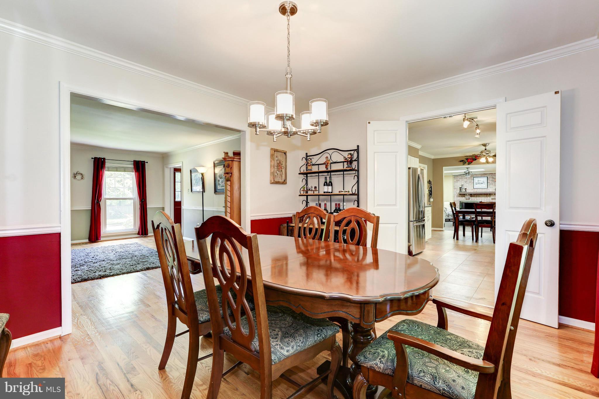 7024 Flax Street Springfield, VA 22152 - Photo 4 of 30 DINING ROOM WITH HARDWOOD