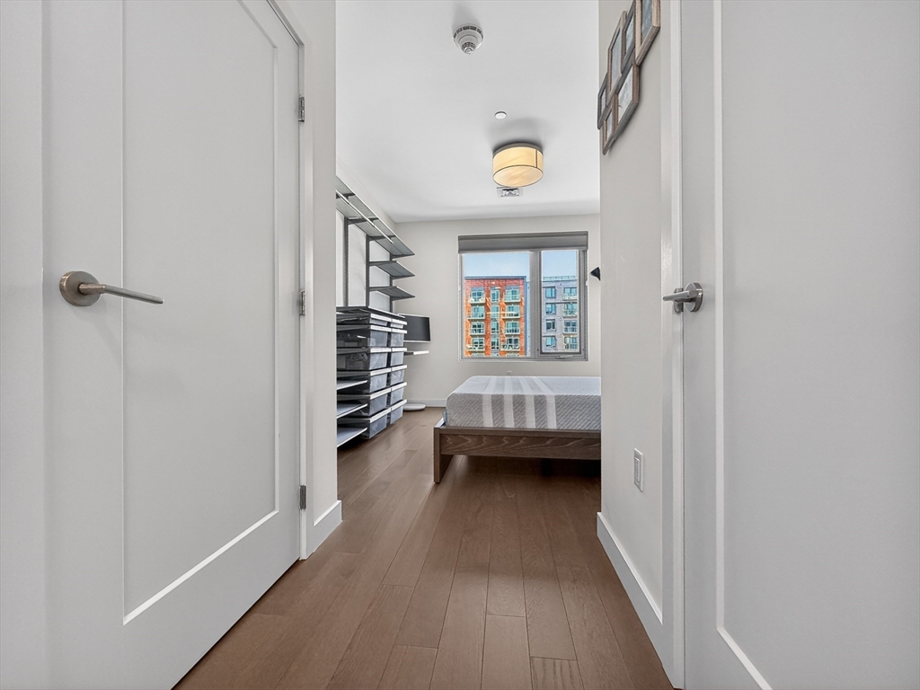 45 Lewis Street, Unit 316 Boston, MA 02128 - Photo 12 of 32 a view of a bedroom from the hallway