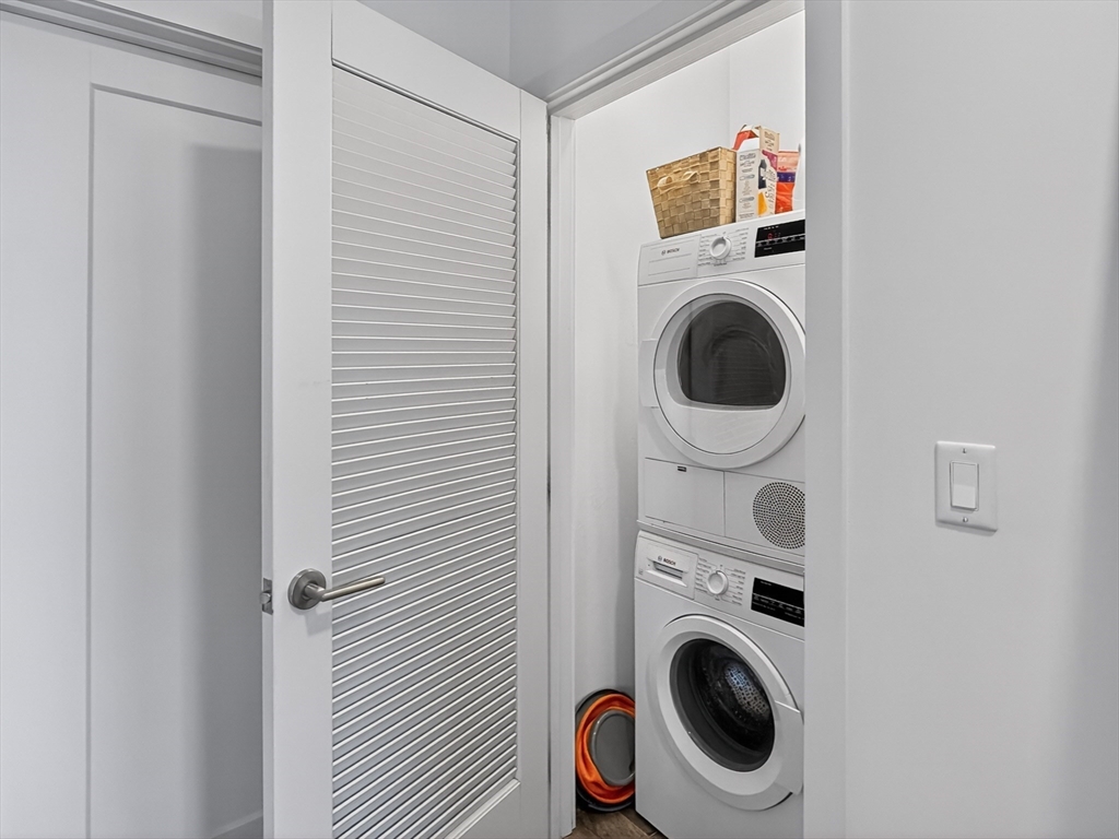 45 Lewis Street, Unit 316 Boston, MA 02128 - Photo 14 of 32 a utility room with dryer and washer