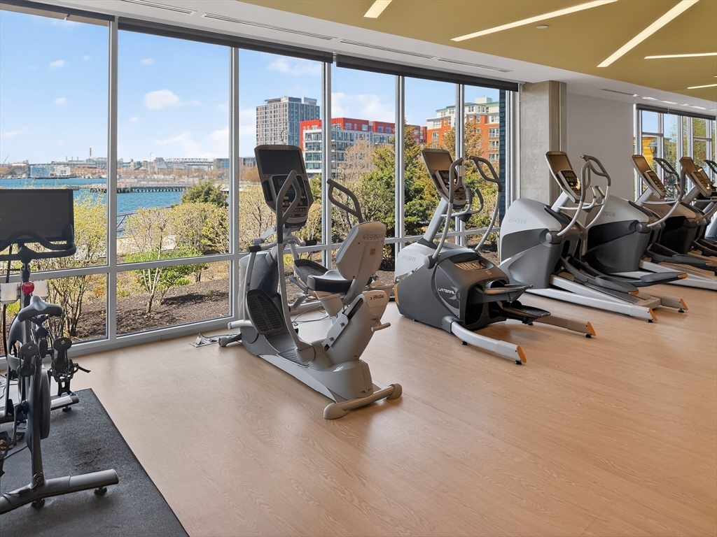45 Lewis Street, Unit 316 Boston, MA 02128 - Photo 18 of 32 a view of a room with gym equipment