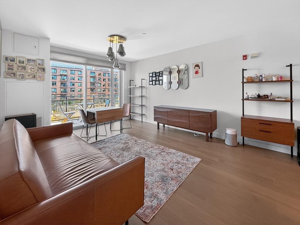 45 Lewis Street, Unit 316 Boston, MA 02128 - Photo 5 of 32 a living room with furniture