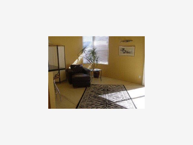 410 Berry Road Watsonville, CA 95076 - Photo 7 of 9 a living room with a rug and a potted plant