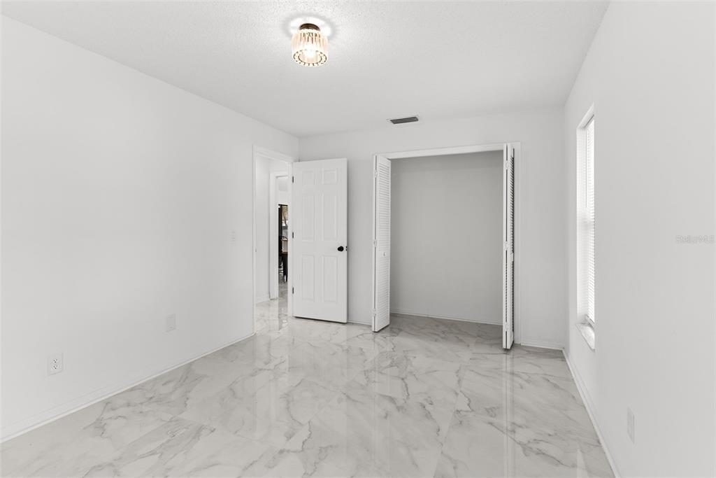 6096 East Tremont Street Inverness, FL 34452 - Photo 27 of 47 an empty room with an entryway