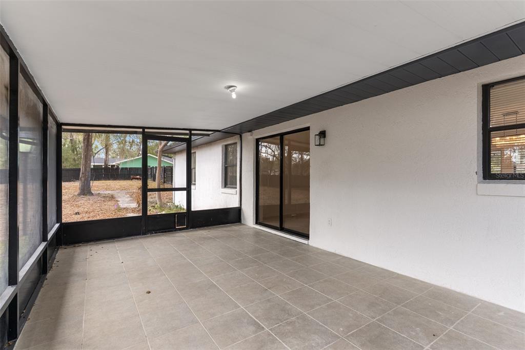 6096 East Tremont Street Inverness, FL 34452 - Photo 31 of 47 a view of an empty room with a window