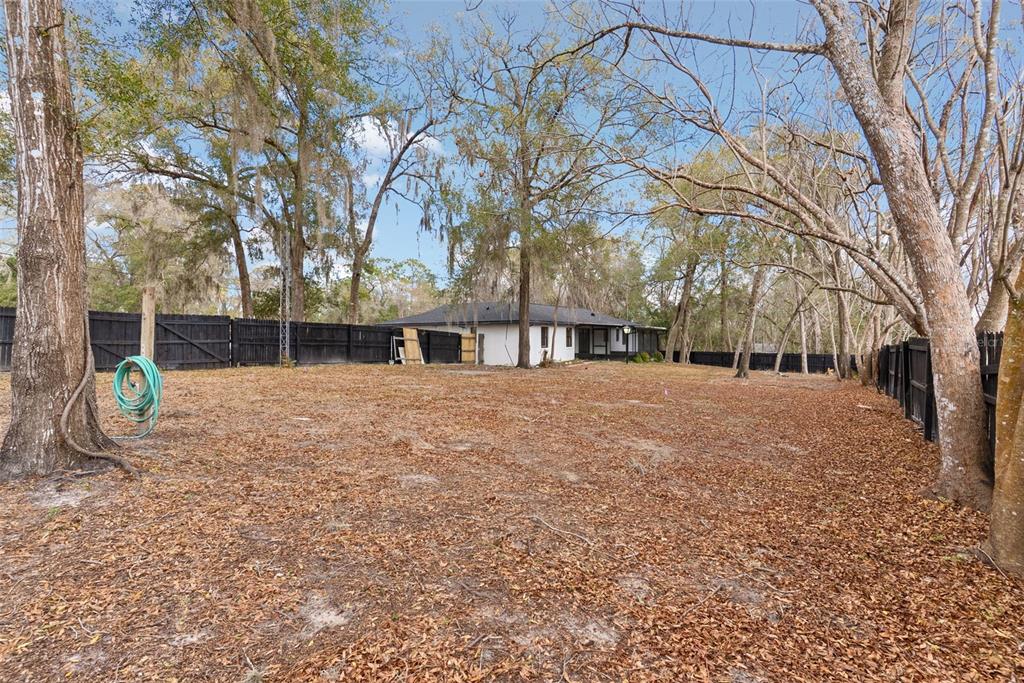 6096 East Tremont Street Inverness, FL 34452 - Photo 35 of 47 a view of house with backyard space