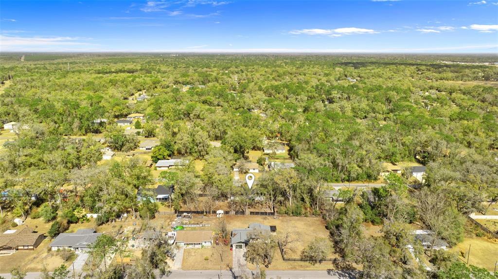 6096 East Tremont Street Inverness, FL 34452 - Photo 43 of 47 a view of an outdoor space and a lake view