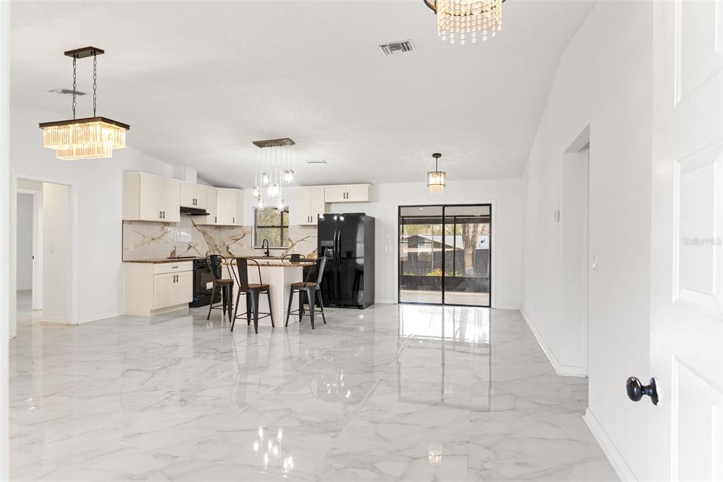 6096 East Tremont Street Inverness, FL 34452 - Photo 8 of 47 a view of a dining area with furniture