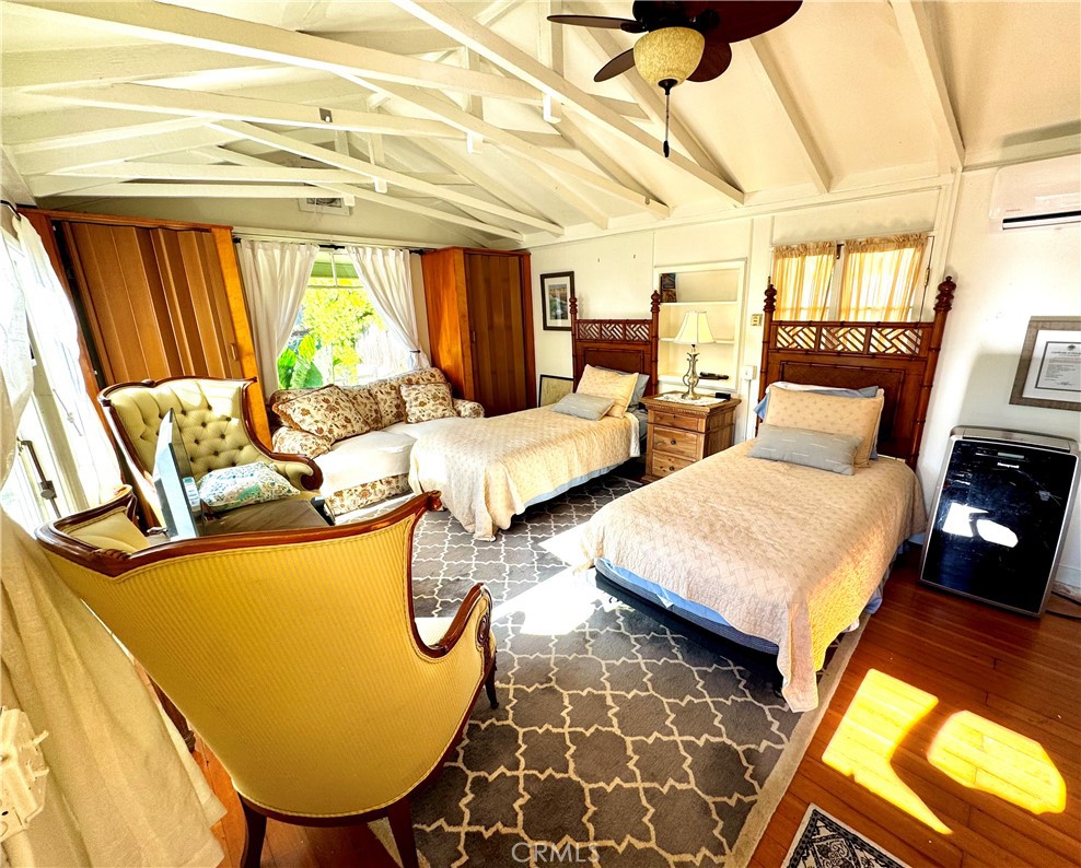 455 Myrtle Street Laguna Beach, CA 92651 - Photo 2 of 9 a bed room with two bed and a window