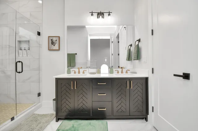 a bathroom with a sink and a mirror