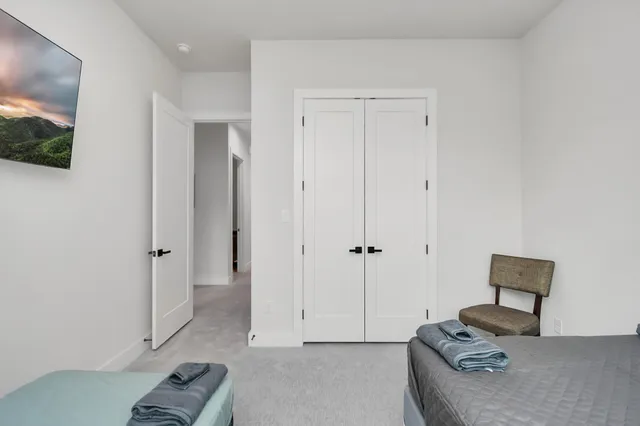 a living room with furniture and a gate