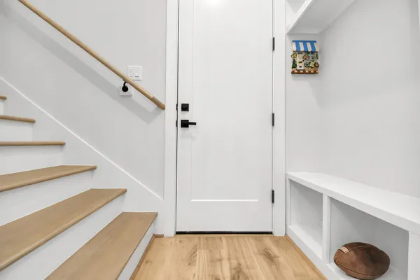 a view of entryway with wooden floor