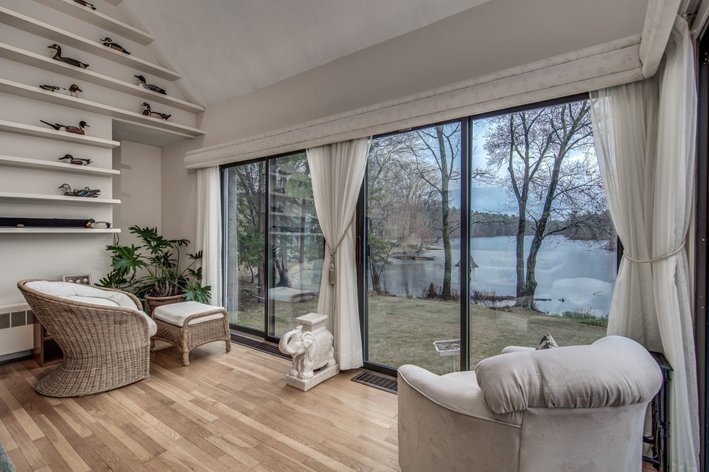 9 Beaver Pond Road Beverly, MA 01915 - Photo 3 of 21 a living room with furniture and a floor to ceiling window