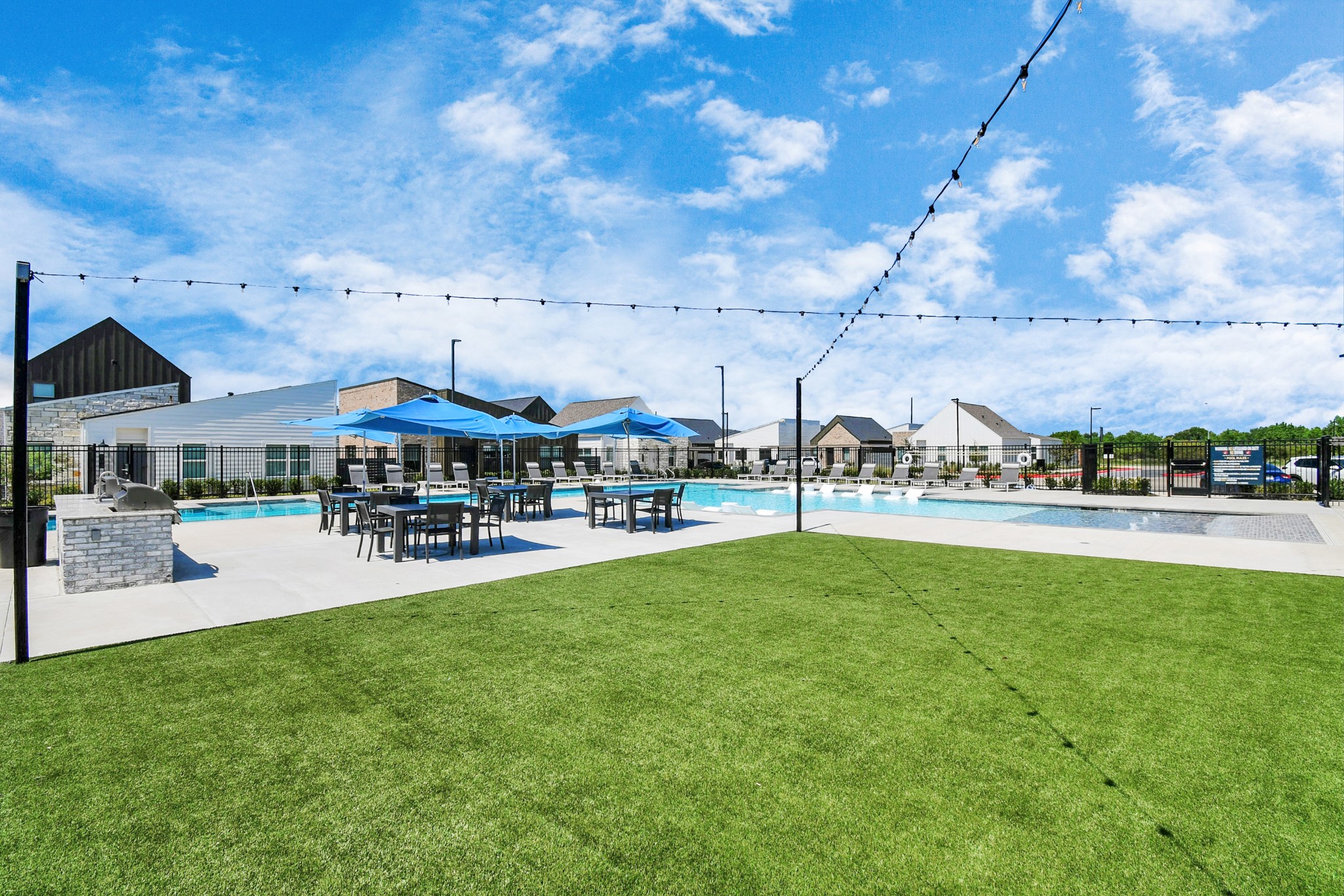 23823 Cumberland Ridge Drive, Unit 621 Hockley, TX 77447 - Photo 21 of 29 a swimming pool with outdoor seating and yard