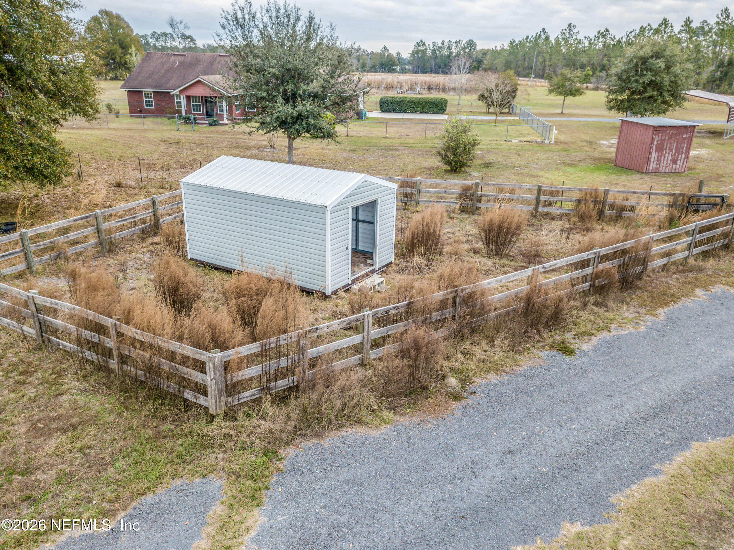18100 Crews Road Glen St. Mary, FL 32040 - Photo 69 of 86 Storage Shed