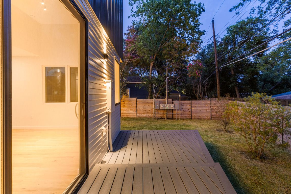 2903 Breeze Terrace, Unit 2 Austin, TX 78722 - Photo 29 of 36 Wooden terrace with a fenced backyard