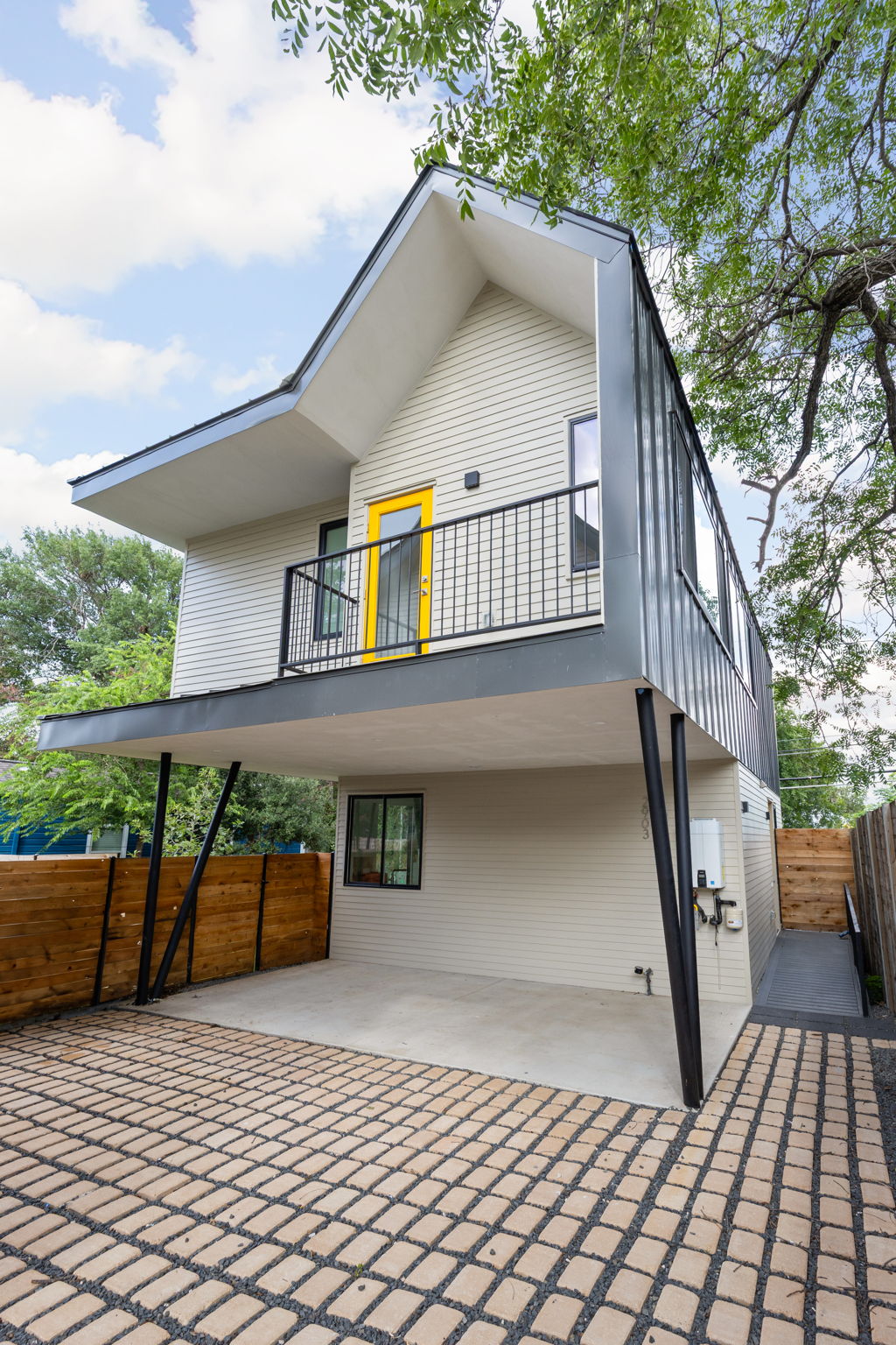 2903 Breeze Terrace, Unit 2 Austin, TX 78722 - Photo 4 of 36 Rear view of property with a balcony and a patio area