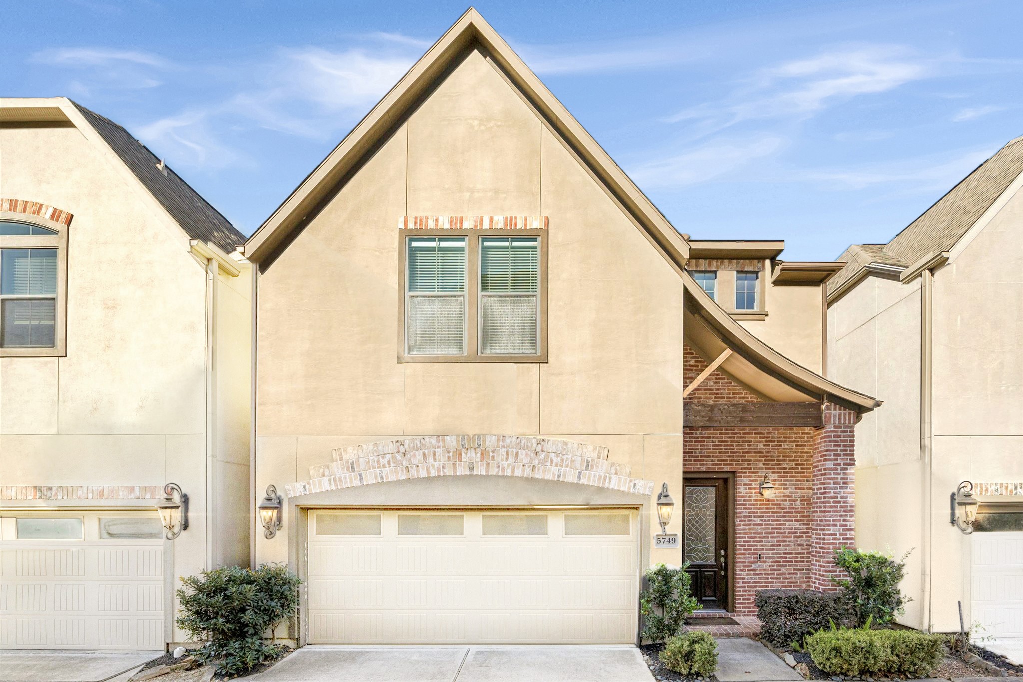 5749 Larkin Street Houston, TX 77007 - Photo 1 of 35 Two story freestanding home in the heart of Cottage Grove. Only 5 miles from downtown and less than a mile from Memorial Park, perfect for a commute in any direction. The home is located only a block from I10, easy in and out. Fenced in driveway for privacy and a fully fenced in backyard space. High ceilings and recessed lighting throughout.
