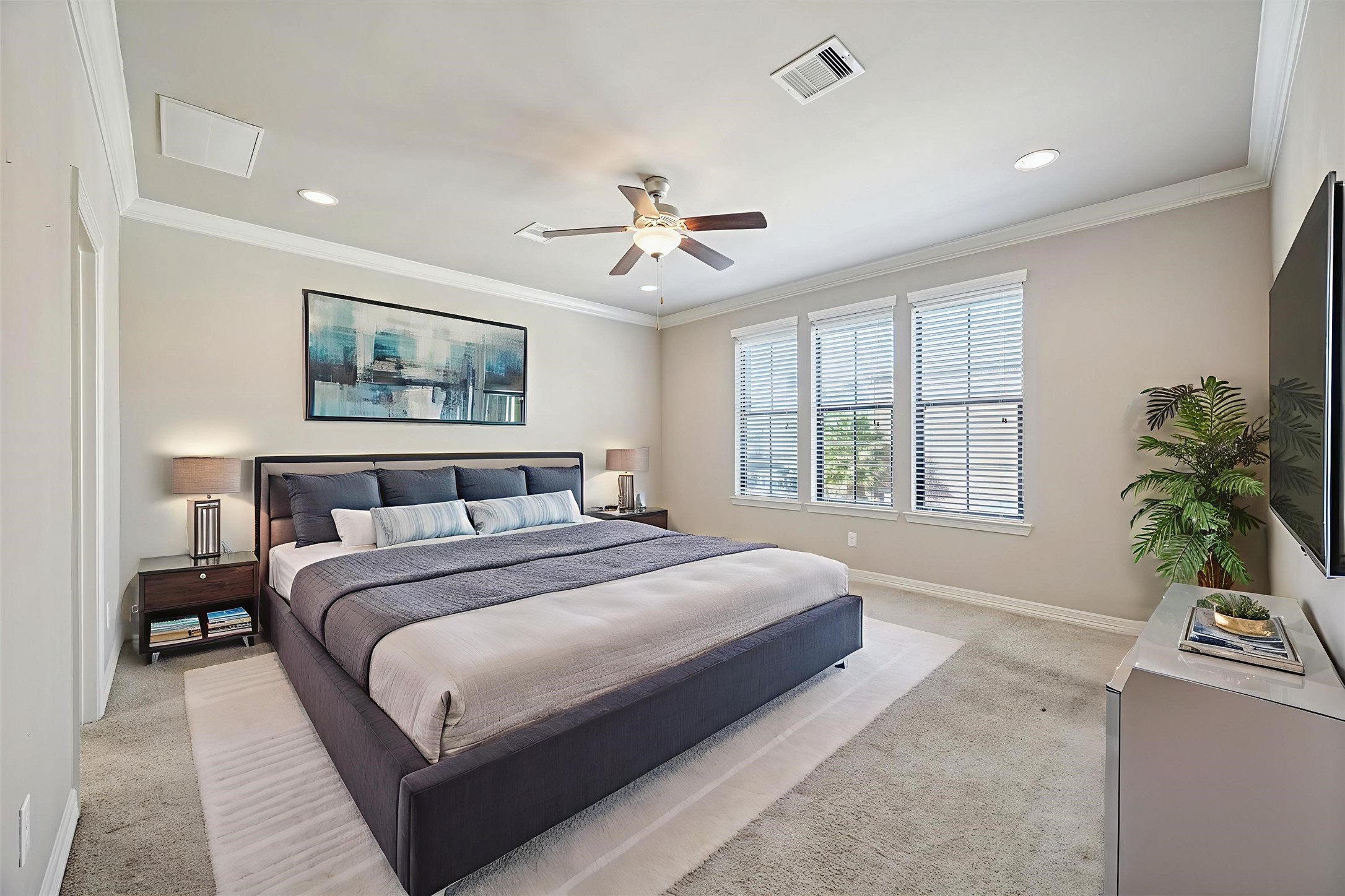 5749 Larkin Street Houston, TX 77007 - Photo 10 of 35 The high ceilings and natural light make the space feel light airy, but still comfortable and cozy. All bedrooms are up, and the common area fills the first floor.