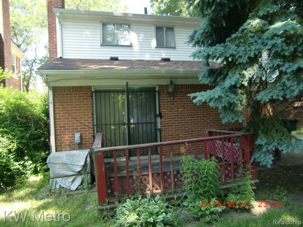 14220 Stahelin Road Detroit, MI 48223 - Photo 2 of 16 Back view of House w Deck.jpg