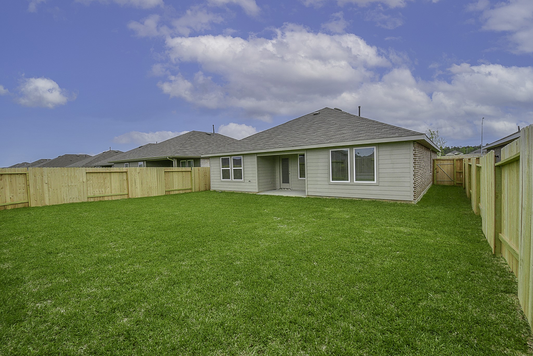 14919 Clay Harvest Ridge Magnolia, TX 77354 - Photo 20 of 28 Ample backyard! Sprinkler system in front and backyard