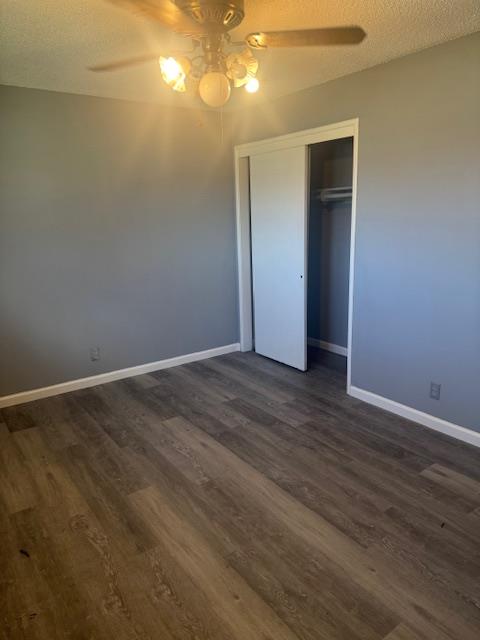 2720 Glen Avenue Merced, CA 95340 - Photo 4 of 7 a view of an empty room with wooden floor and closet