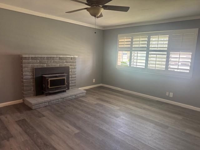 2720 Glen Avenue Merced, CA 95340 - Photo 7 of 7 an empty room with wooden floor fireplace and windows