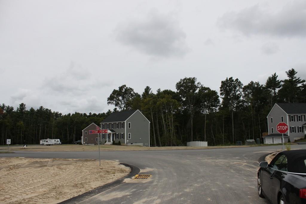 Lot 7 Stony Point Road Middleboro, MA 02346 - Photo 8 of 11 a view of a house with a cars park