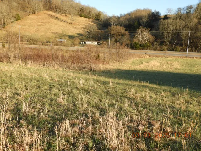 a view of mountain with lake view