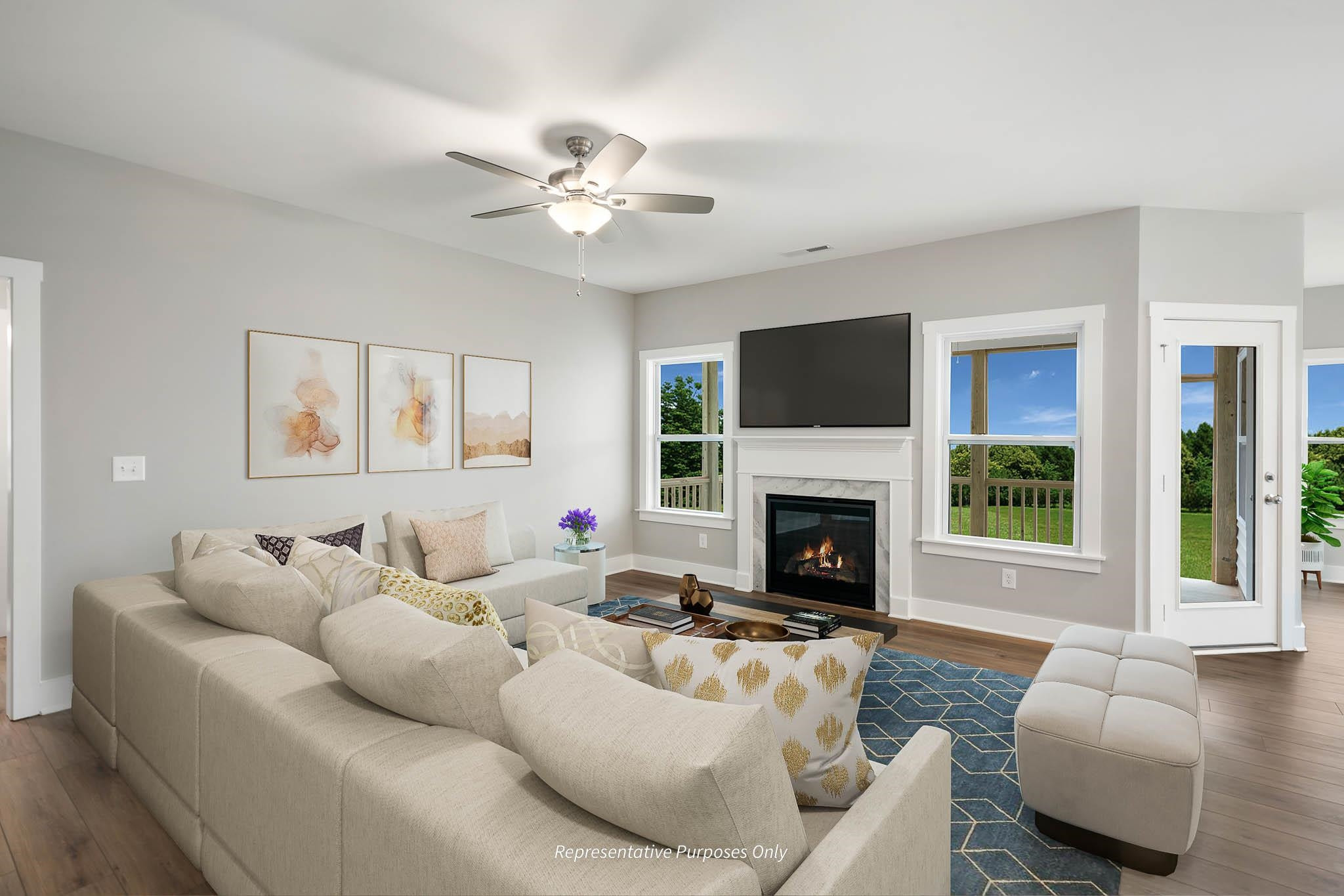 34 Beacon Hl Road Lillington, NC 27546 - Photo 23 of 41 a living room with furniture a fireplace and a flat screen tv
