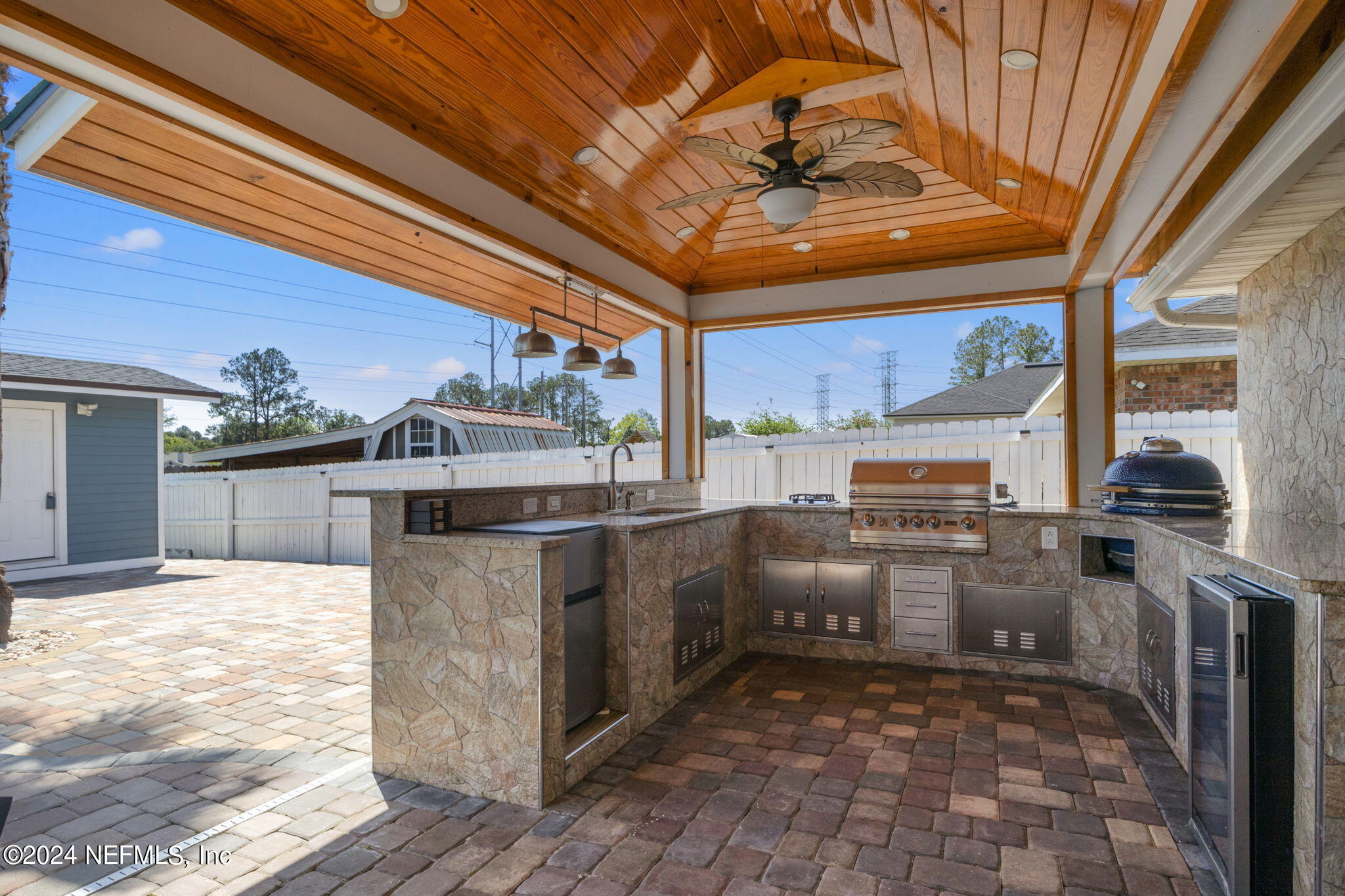 487 Portobello Drive Jacksonville, FL 32221 - Photo 6 of 9 a kitchen with stainless steel appliances granite countertop a sink and cabinets