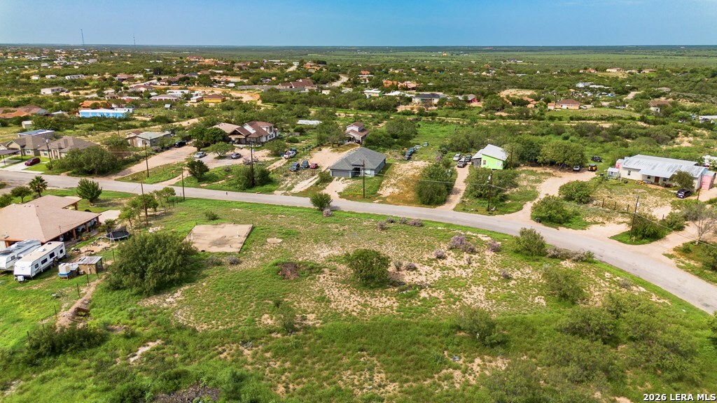 1326 Wagon Wheel Road Eagle Pass, TX 78852 - Photo 6 of 17 an aerial view of residential houses with outdoor space and trees
