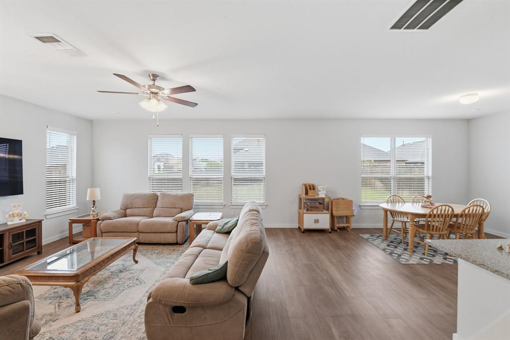 4228 Bullock Lane Forney, TX 75126 - Photo 14 of 40 a living room with furniture and a large window
