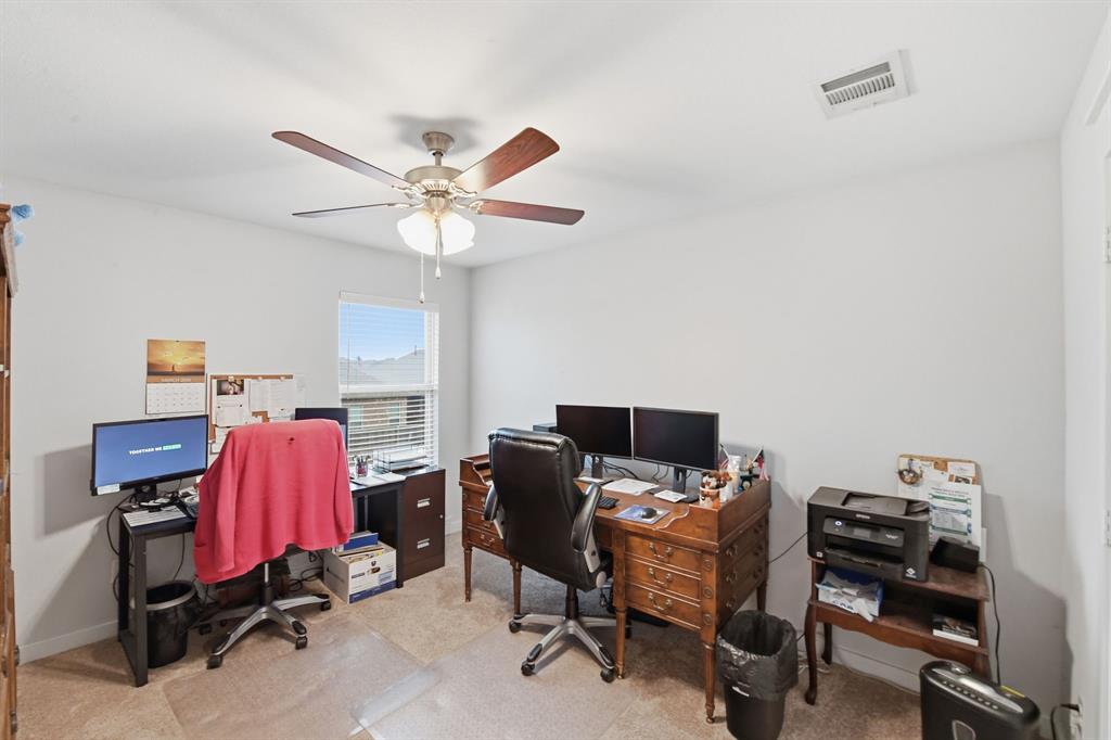 4228 Bullock Lane Forney, TX 75126 - Photo 31 of 40 a view of a workspace with furniture and a window