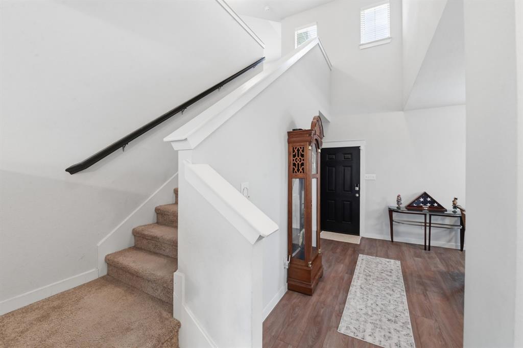 4228 Bullock Lane Forney, TX 75126 - Photo 4 of 40 a view of entryway and hall with wooden floor