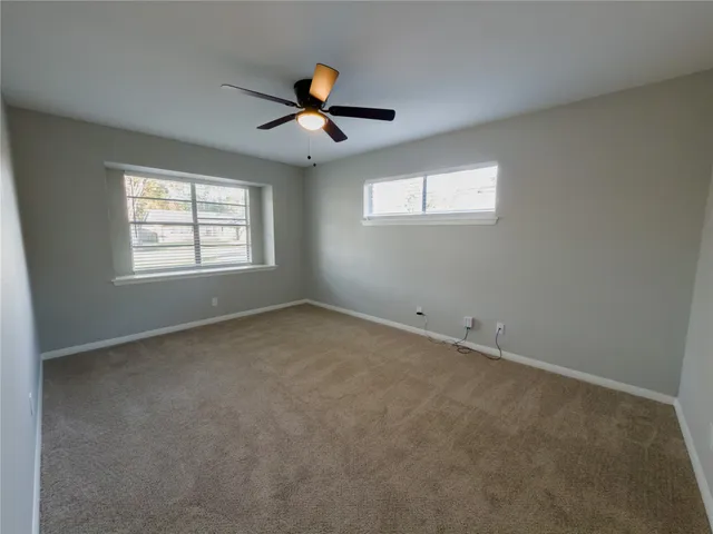 a bathroom with a sink double vanity and a mirror