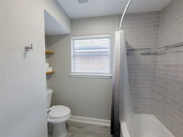 a bathroom with a bathtub