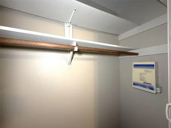 a view of a room with rack on the wall