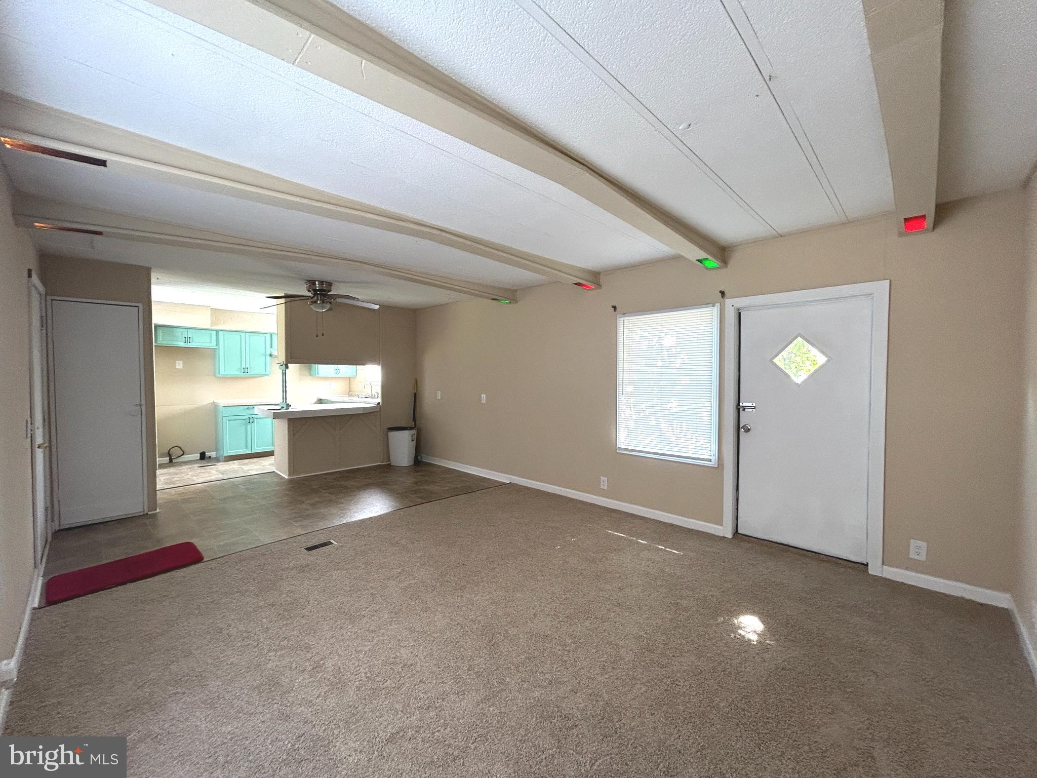 36392 Old Mill Road Ocean View, DE 19970 - Photo 4 of 26 Living Room looking into Kitchen and Rear Door