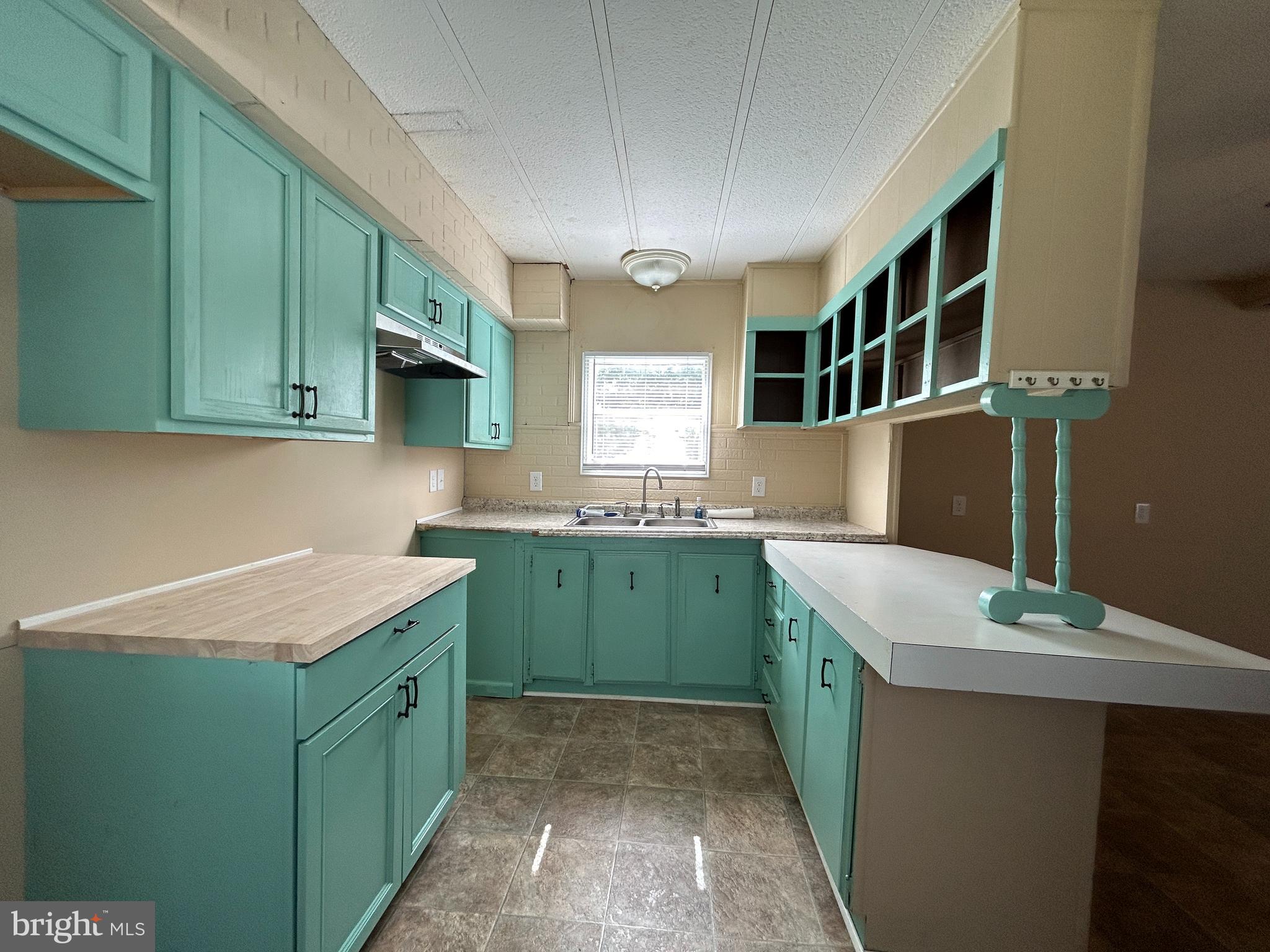 36392 Old Mill Road Ocean View, DE 19970 - Photo 6 of 26 Galley Kitchen, with new Hood Vent
