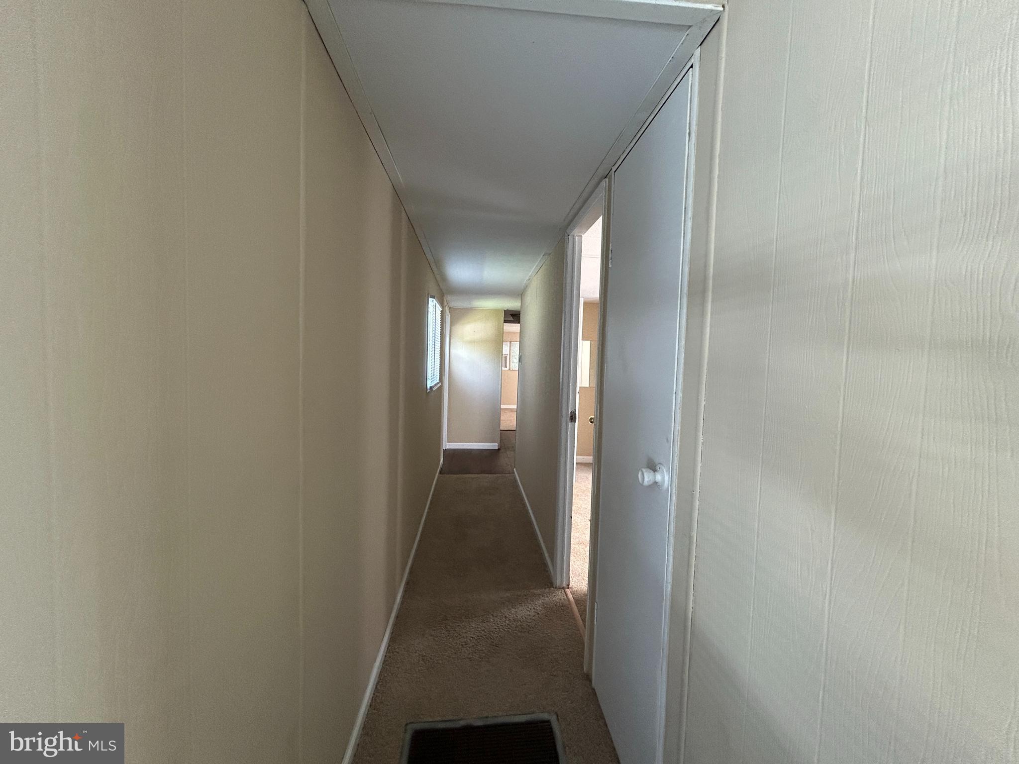 36392 Old Mill Road Ocean View, DE 19970 - Photo 9 of 26 The hallway to the Bedrooms, Bath and W/D Area